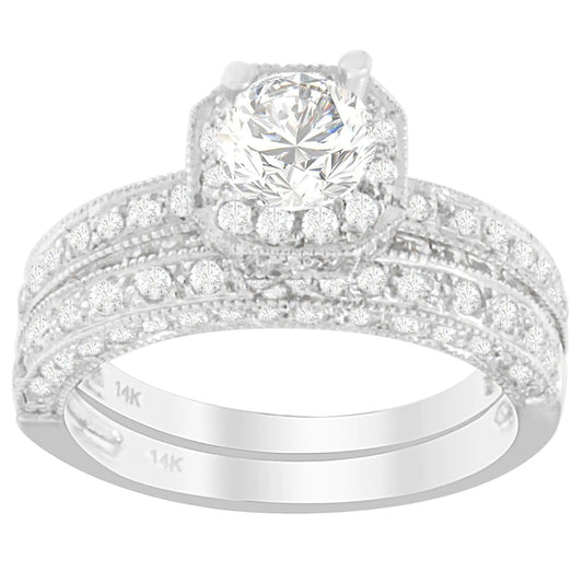 14K white gold diamond ring with round-cut stones in prong setting.