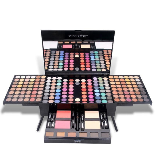 ULTIMATE MAKEUP SET with a variety of colorful eyeshadows and cosmetics.