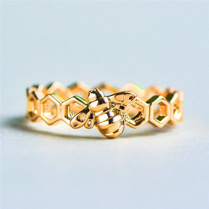 Gold and Rose Gold Colored Honeycomb Ring with Bee Accent